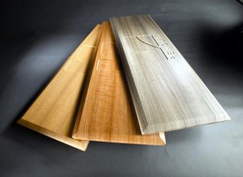 Laminates suit membrane pressing of wood-core products.