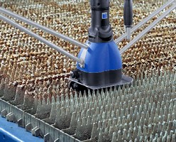 Slat Cleaner removes slag from laser cutting machines.