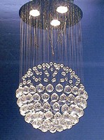 Lighting Fixture features cluster of suspended crystals.