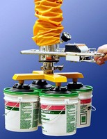 Vacuum Tube Lifter simultaneously handles four 5 gal pails.