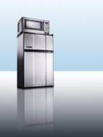 Appliance combines refrigerator, freezer, and microwave.