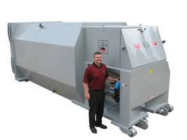 Self-Contained Auger Compactor processes wet and dry waste.