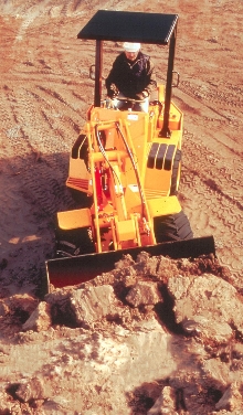 Wheel Loader/Carrier has 65 hp diesel engine.