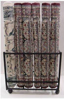 Metal Rug Racks are used for shipping and display.