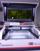 Laser Engraving Machine features 24 x 24 in. table.
