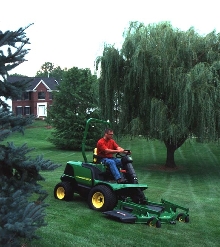 Front Mower has 36 hp motor for 15 mph transportation.