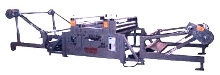 Belt Slitter cuts light to heavy grade belting.