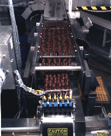 Packaging Machine wraps delicate food products.