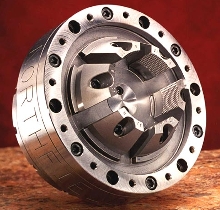 Diaphragm Chuck grips compressor scrolls.