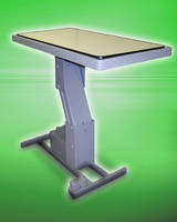 Ergonomic Workstation has variable height reversible top.