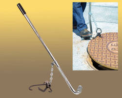 Utility Manhole Cover Lifter features rubber hand grips.