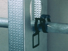 Clip positions and protects cable and pipe in metal studs.