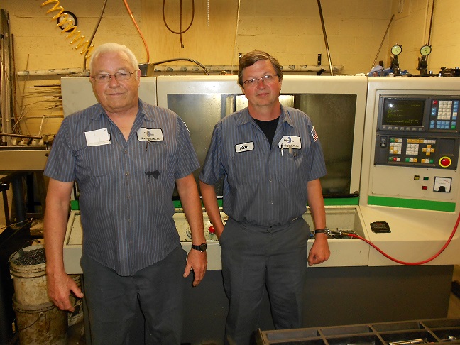 Paul Carrignan (left) and Ron Krutz have been running New England CNC for 26 of its 54 years in business. Credit: Pat Toensmeier